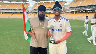 Harvansh Singh poses with his father