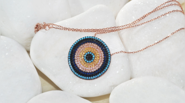 A contemplative person pondering the true meaning of the evil eye.
