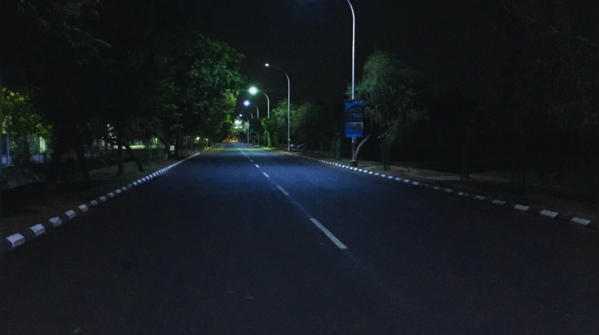 A deserted road in Delhi Cantonment at night.