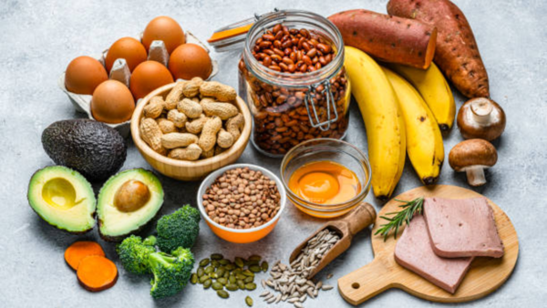 A selection of foods rich in Vitamin B12, like fish and eggs.