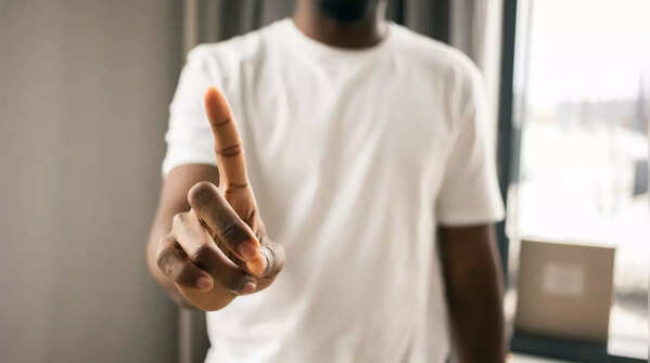 Person confidently declining an offer.