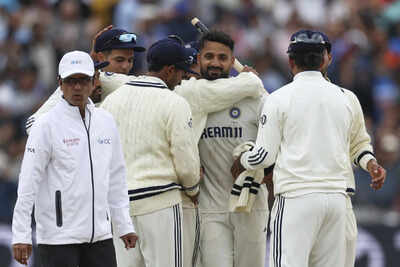 Akash Deep and teammates celebrate victory against England at Edgbaston.