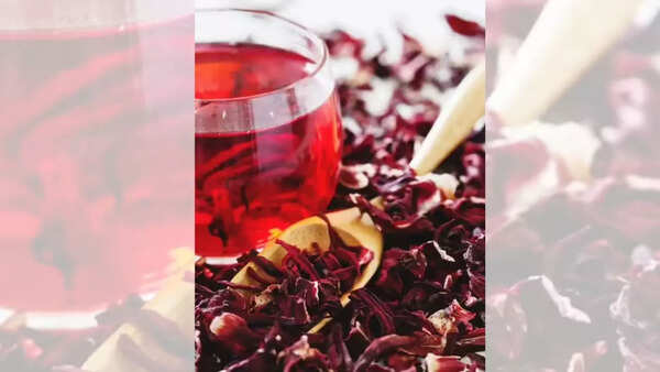 Vibrant red hibiscus tea in a clear glass
