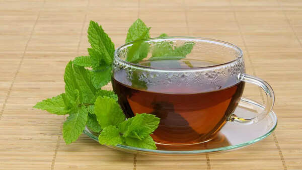 Refreshing peppermint tea with vibrant green leaves